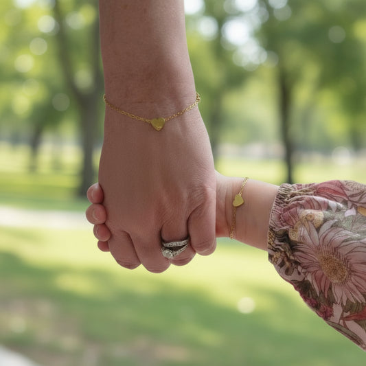 Two hands holding each other with blurred background
